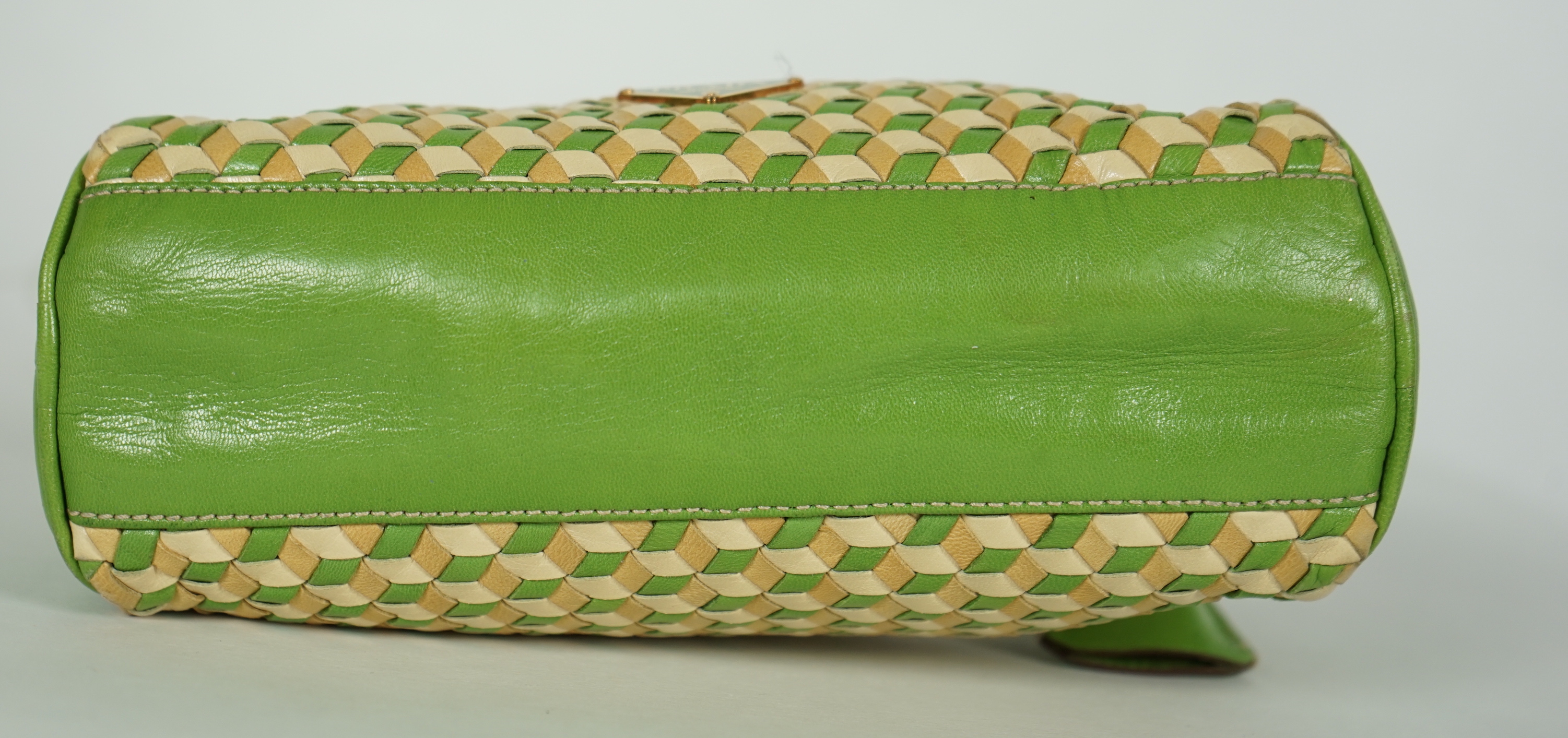 A Prada green and beige leather Intreccio Cube shoulder bag, width 20cm, height 13cm, depth 5.5cm